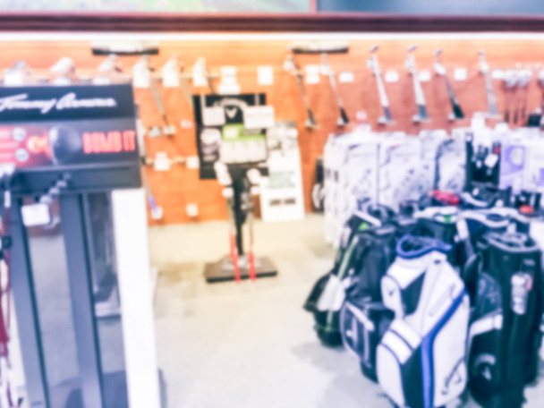 Blurry variedade de fundo de engrenagens de golfe na loja de departamento de esporte nos EUA
 - Foto, Imagem