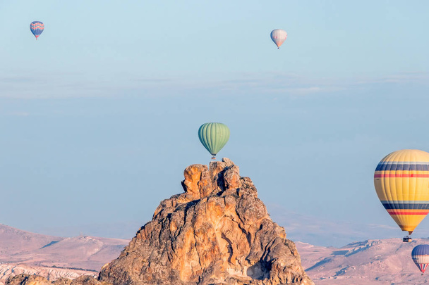 hot air balloon in sky in Goreme Cappadocia - Фото, изображение