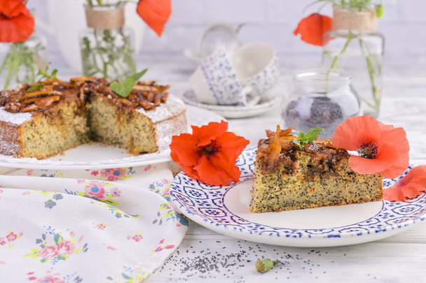 Pie with poppy seeds on a white background. Homemade pastries an - Zdjęcie, obraz