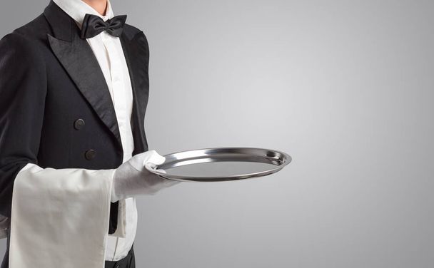 Waiter serving with white gloves and steel tray - Photo, Image