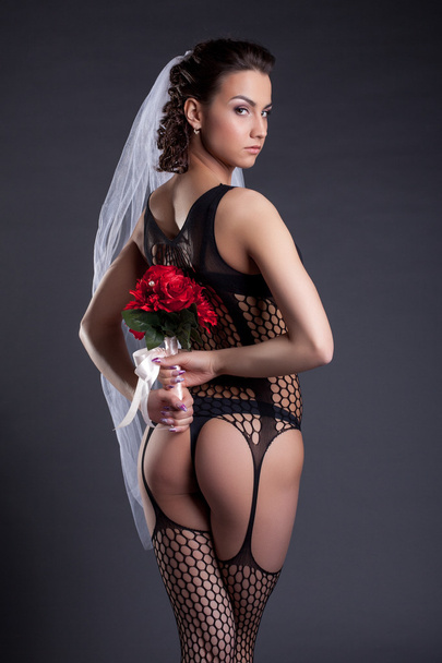 Graceful sexual bride posing in black lingerie - Zdjęcie, obraz