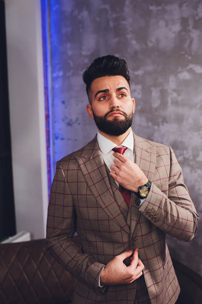 Handsome bearded businessman in classic suit. Mens beauty, fashion. Male in suit, man in tuxedo, stylish in a cloth jacket. - Fotografie, Obrázek