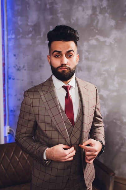 Handsome bearded businessman in classic suit. Mens beauty, fashion. Male in suit, man in tuxedo, stylish in a cloth jacket. - Foto, Imagem