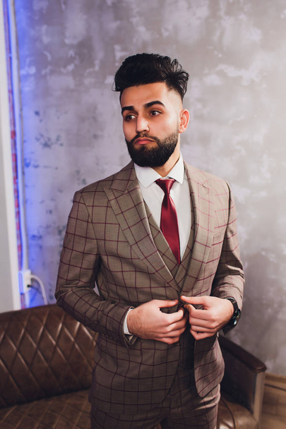 Handsome bearded businessman in classic suit. Mens beauty, fashion. Male in suit, man in tuxedo, stylish in a cloth jacket. - Photo, Image