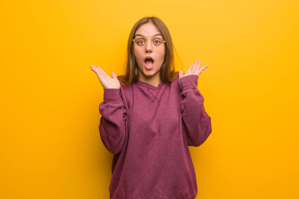Young casual woman surprised and shocked - Photo, Image
