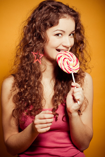 Happy young woman with lollipop - Foto, Imagen