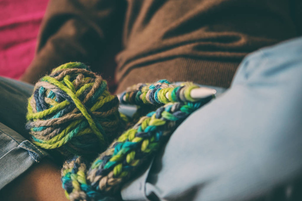 A woman knits from thick yarn. - Fotografie, Obrázek
