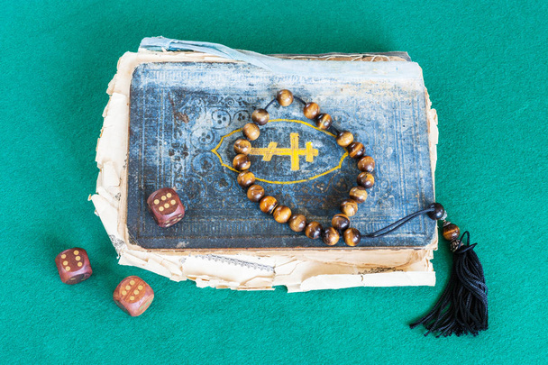 old book, worry beads and dices with six points - Photo, Image