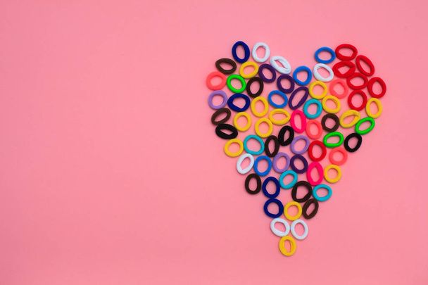Heart shape in the form of multi-colored hair elastics - Photo, image