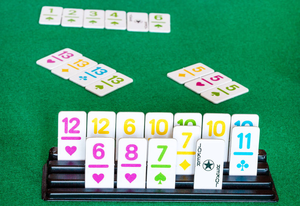 tiles in rack and board during playing in Rummy - Photo, Image