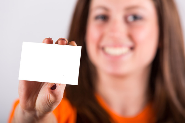 Young Woman Holding Blank Card - Foto, Imagen