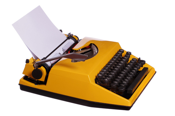 Old yellow typewriter with paper - Photo, Image
