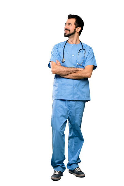 Full-length shot of Surgeon doctor man happy and smiling over isolated white background - Foto, Bild