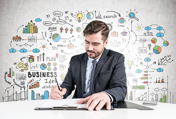 Man signing document, business plan sketch - Фото, зображення