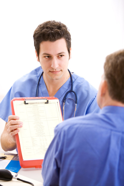 Doctors: Male Doctor with Patient - Foto, afbeelding