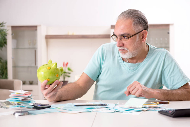 White bearded old man in budget planning concept  - Photo, Image