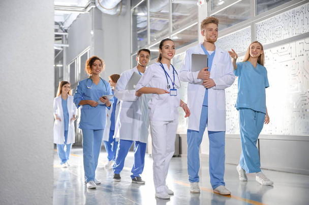 Group of medical students in college hallway - Foto, Imagem