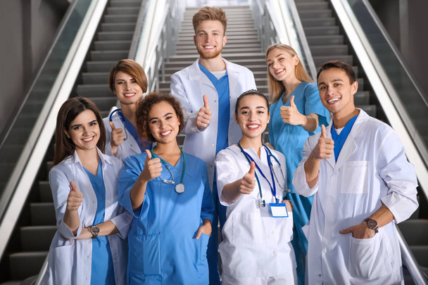 Group of medical students in college hallway - Photo, image
