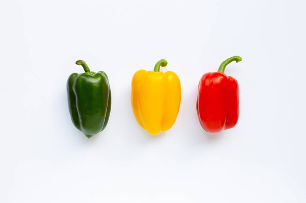 Green, yellow and red fresh bell pepper on white. - Foto, Imagem