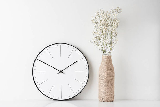 Home office minimal workspace desk with wall clock - Photo, Image