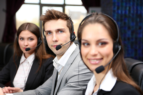 Call center operators at wor - Photo, Image