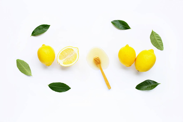 Limão fresco com mel em branco
  - Foto, Imagem