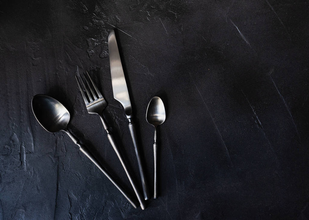 Cutlery set on rustic background - Photo, image
