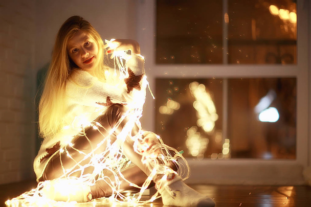 girl with Christmas garland / new year evening, funny illumination, portrait of a dream model - Φωτογραφία, εικόνα