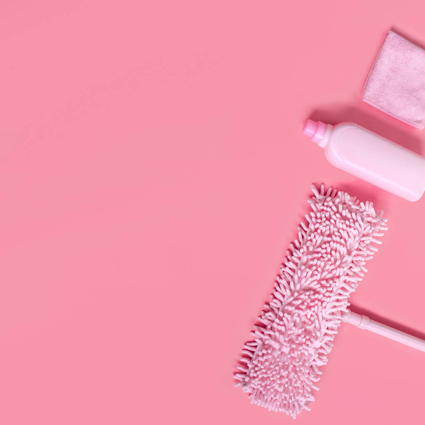 MOP, rag and detergent-pink set on pink background for spring cleaning. Place for text. - Φωτογραφία, εικόνα