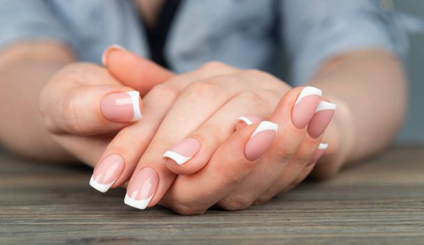 hands with french manicure - Foto, Imagen