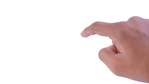 Homem apontando o dedo para algo no fundo branco. Foco seletivo
 - Foto, Imagem