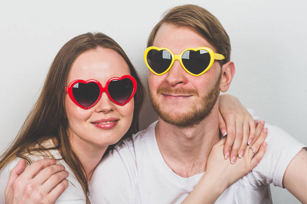 couple in heart-shaped sunglasses  - Фото, зображення