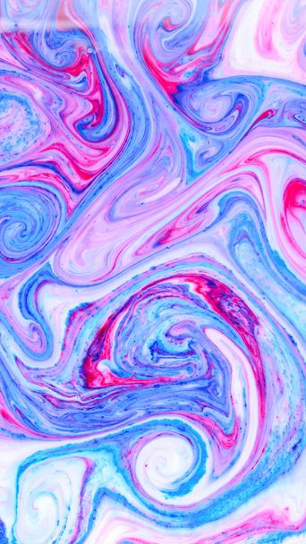 Abstract multicolored background. Screen saver. Fluid art with pink blue color. Blue pink texture. Colored paint stains in liquid - Fotografie, Obrázek