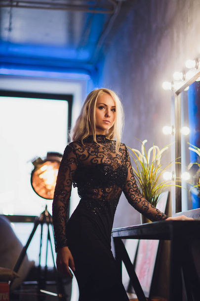 beautiful woman model posing in elegant dress on the studio background. - 写真・画像