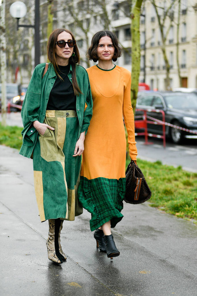 A trendy woman poses for street snaps during the Paris Fashion Week Womenswear Fall/Winter 2019/2020 street snap in Paris, France, 1 March 2019.  - Фото, изображение