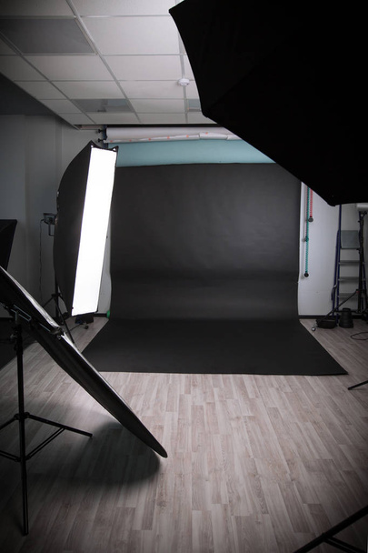 photo Studio with a variety of lighting equipment. photo with copy space - Fotoğraf, Görsel