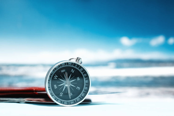Time to Travel. Idea for tourism with passport, tickets and compass on the background of the sea. Concept on the theme of flights. - Photo, Image