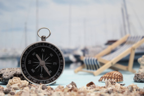 Time to Travel. Idea for tourism with passport, tickets and compass on the background of the sea and yacht. Concept on the theme of flights. - Foto, Imagem