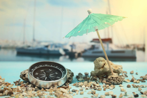 Time to Travel. Idea for tourism with passport, tickets and compass on the background of the sea and yacht. Concept on the theme of flights. - Φωτογραφία, εικόνα