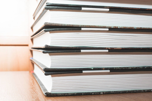 School books for education lie on the shelf. - Foto, Bild