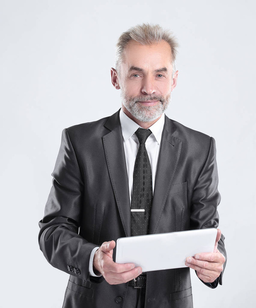modern businessman with digital tablet.isolated on grey background - Zdjęcie, obraz