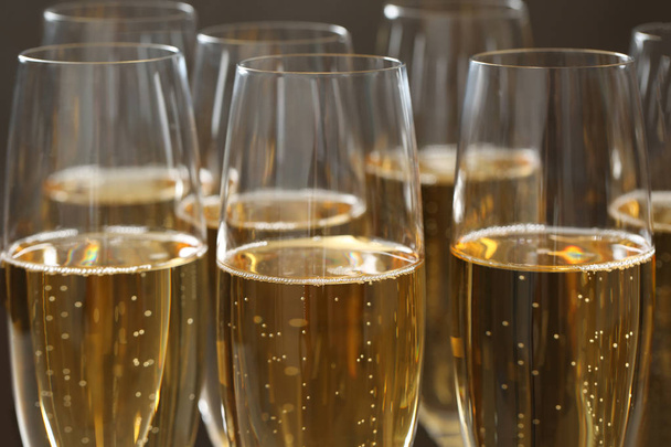 Many glasses of champagne as background, closeup view - Zdjęcie, obraz
