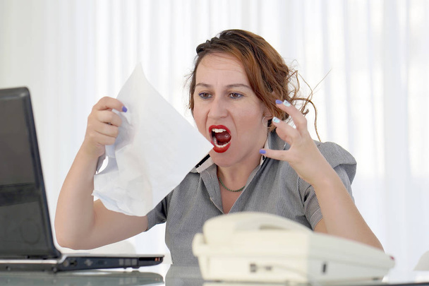Woman in stress in front of computer - Photo, Image