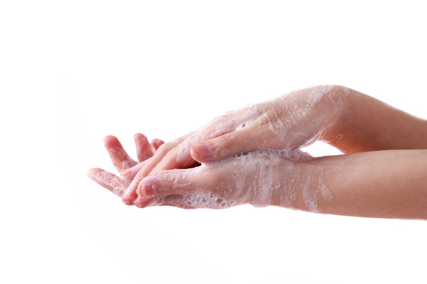 Beyaz bir arka plan üzerinde izole yıkama eller - Fotoğraf, Görsel
