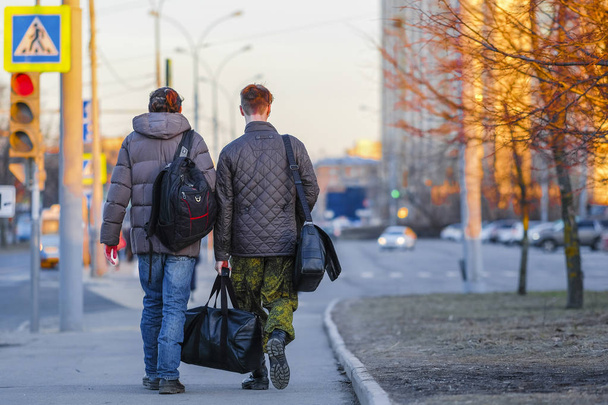 Moscow, Russia - April, 5, 2019: pedestrians on a crossroad in Moscow, Russia - 写真・画像