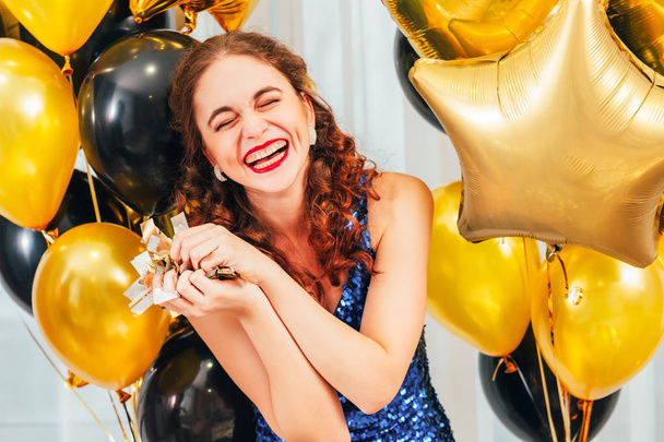 birthday party celebration amused girl confetti - Foto, immagini