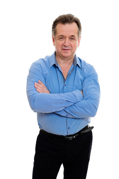 Happy and smile old mature businessman in shirt. Crossed his arms over his chest, isolated on white background. Positive human emotion, facial expression - Фото, зображення