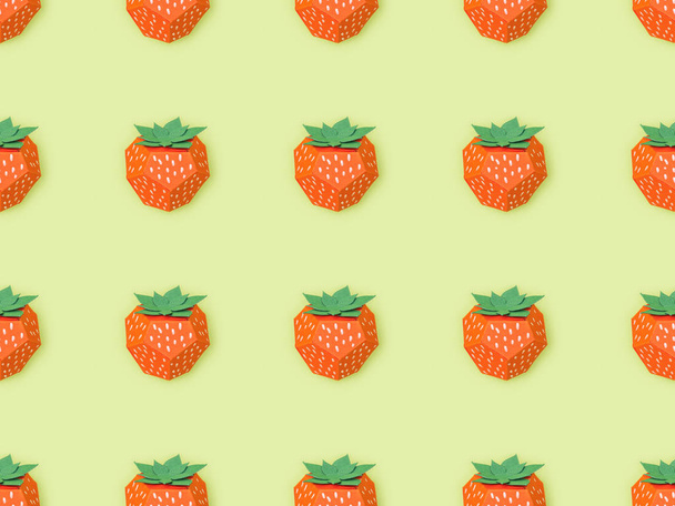 top view of pattern with handmade paper strawberries isolated on yellow - 写真・画像