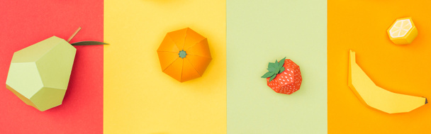 панорамный снимок различных фруктов ручной работы на разноцветных бумажных полосах
 - Фото, изображение