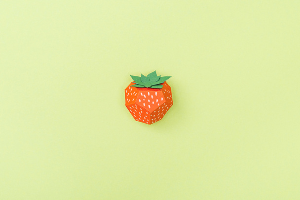 top view of handmade paper strawberry isolated on green - Φωτογραφία, εικόνα